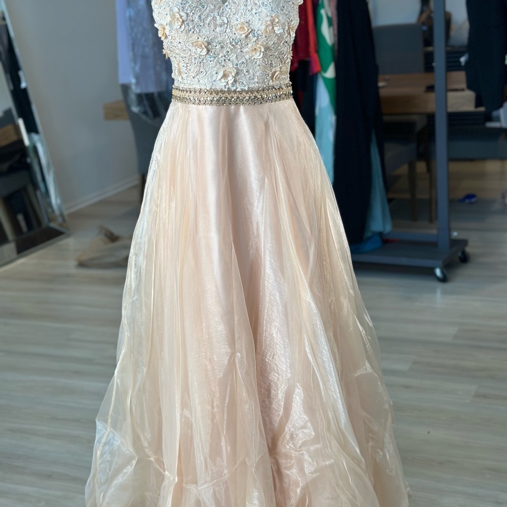 Elegant Cream Gown with Floral Embellishments
